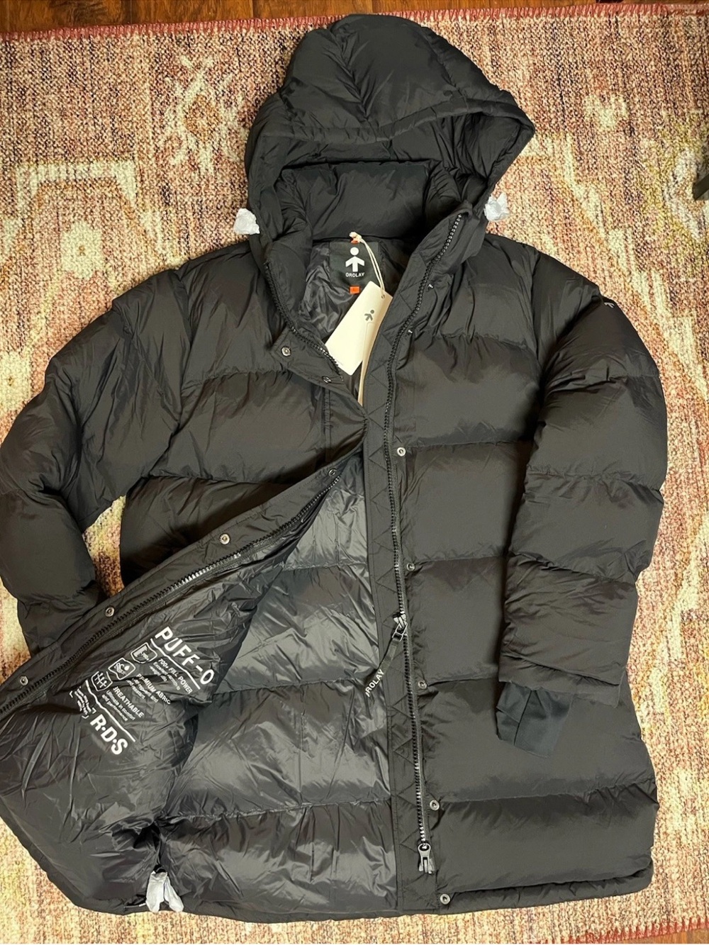 Orolay Puff-O hip length size Large blacket puffer jacket-New with tags (unisex)